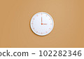 Clock on wall. White wall clock isolated on brown background.  102282346