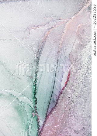 Marble stone glowing golden veins. High resolution. Abstract fluid art painting in alcohol ink technique, mixture blue, red and gold paints. Marble stone glowing golden veins. High resolution. Abstract fluid art painting in alcohol ink technique, mixture blue, red and gold paints. 102282559