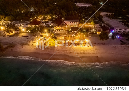 Aerial view of Gili Trawangan beach during sunset in Lombok, Indonesia 102285984