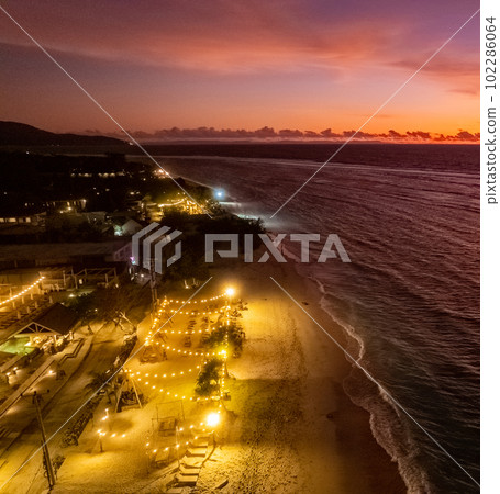Aerial view of Gili Trawangan beach during sunset in Lombok, Indonesia 102286064