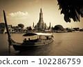 Wat Arun at sunset with long tail boat, in Bangkok, Thailand. Generative AI 102286759