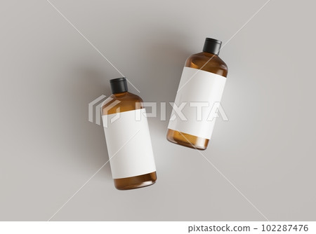 Two brown plastic cosmetic containers with labels, shampoo bottles laying on gray background front view 3D render mockup 102287476