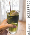 Green tea with coconut juice in coffee shop cafe 102287790