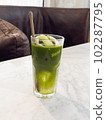 Green tea with coconut juice in coffee shop cafe 102287795