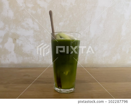 Green tea with coconut juice in coffee shop cafe 102287796