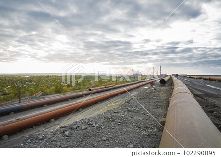 Uncovered pipeline. atural gas construction, crude oil transmission. Uncovered pipeline. atural gas construction, crude oil transmission. 102290095