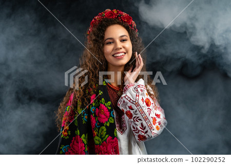 Beautiful woman in ethnic ukrainian costume on black. Ukraine, style, folk. Beautiful woman in ethnic ukrainian costume on black. Ukraine, style, folk. 102290252