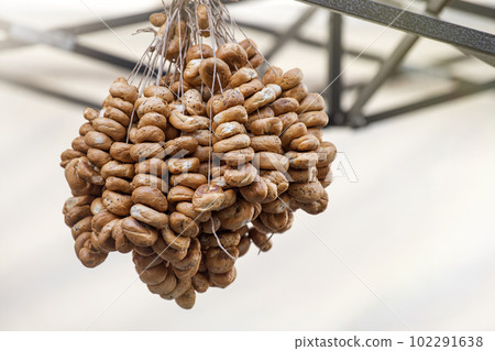 A bundle of dry ring-shaped cookies. Russian traditional cookies. A bundle of dry ring-shaped cookies. Russian traditional cookies. 102291638