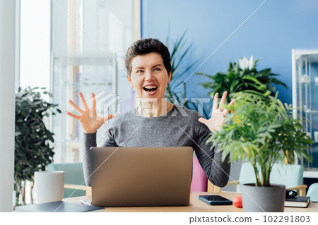 Excited happy middle aged neutral gender woman feeling winner rejoicing online win got new job opportunity, overjoyed motivated girl doing yes gesture, receive good results on pc celebrating admission 102291803