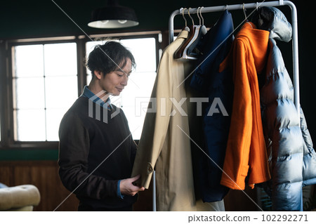 Men choosing clothes 102292271