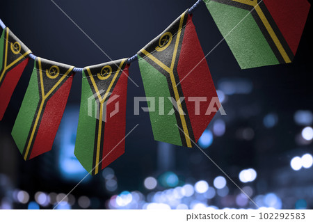 A garland of Vanuatu national flags on an abstract blurred background A garland of Vanuatu national flags on an abstract blurred background 102292583
