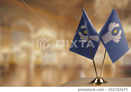 Small flags of the CIS on an abstract blurry background 102292675