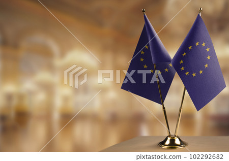 Small national flag of the European Union on a black background 102292682