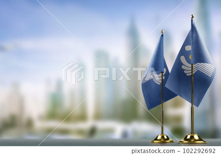 Small flags of the CIS on an abstract blurry background 102292692