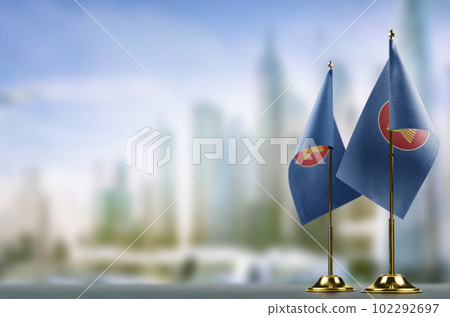 Small flags of the ASEAN on an abstract blurry background 102292697