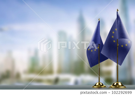 Small national flag of the European Union on a black background 102292699