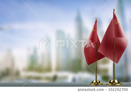 Small flags of the USSR on an abstract blurry background 102292700