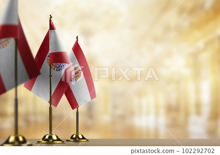 Small flags of the French Polynesia on an abstract blurry background Small flags of the French Polynesia on an abstract blurry background 102292702