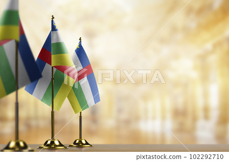 Small flags of the Central African Republic on an abstract blurry background 102292710