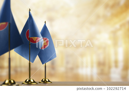 Small flags of the ASEAN on an abstract blurry background 102292714