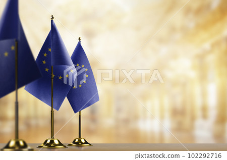 Small national flag of the European Union on a black background 102292716