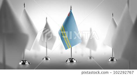 The national flag of the Aruba surrounded by white flags 102292767