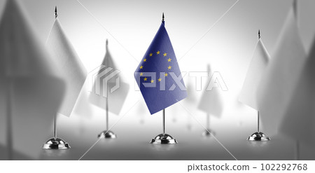 The national flag of the European Union surrounded by white flags 102292768