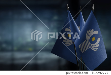 Small flags of the CIS on an abstract blurry background 102292777
