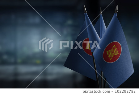 Small flags of the ASEAN on an abstract blurry background 102292782