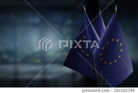 Small national flag of the European Union on a black background 102292784