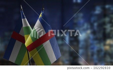 Small flags of the Central African Republic on an abstract blurry background 102292810