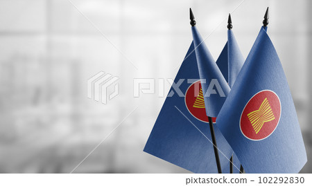 Small flags of the ASEAN on an abstract blurry background 102292830