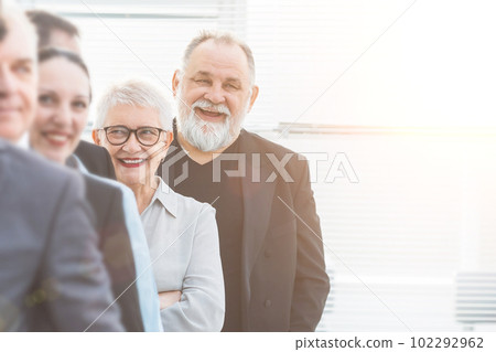 close up. a group of diverse business people standing in line. busine close up. a group of diverse business people standing in line. busine 102292962