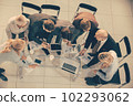 top view. the business team works with financial documents in the office . 102293062