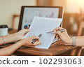 close up. colleagues analyzing General financial information . 102293063