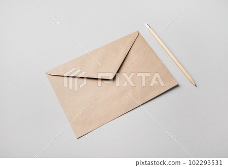 Envelope and pencil 102293531