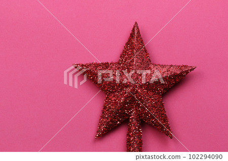 Red star isolated is decorates the top of a pine tree for Christmas or New Year. 102294090