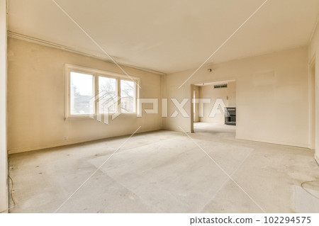 an empty room with no one in the house or building that needs to be cleaned and ready for new construction 102294575