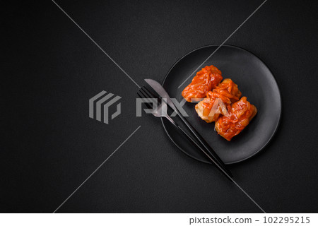 Delicious cabbage rolls with meat, rice, salt, spices and herbs Delicious cabbage rolls with meat, rice, salt, spices and herbs 102295215
