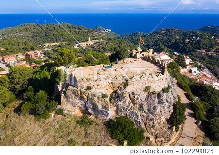 View from drone of remains of medieval castle of Begur, Catalonia, Spain 102299023