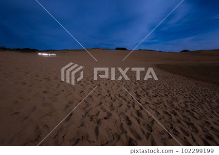 Tottori sand dunes at moonlit night in Tottori prefecture, Japan 102299199