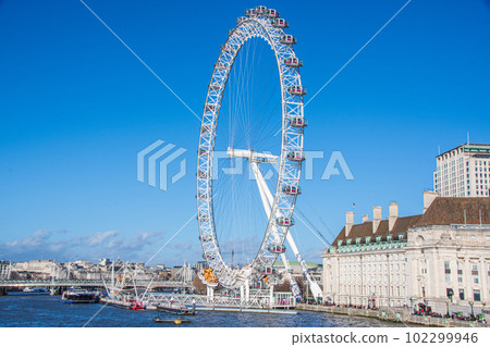 London Eye, Blue Sky and River Thames London Eye, Blue Sky and River Thames 102299946