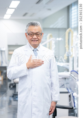 Dental care male dentist in white coat Dental care male dentist in white coat 102301130