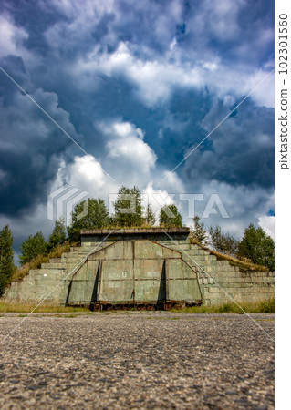 Hangars at a former military airport in northern Czech republic, used by the Soviet army. Hangars at a former military airport in northern Czech republic, used by the Soviet army. 102301560
