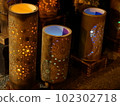 Festival lighting of traditional bamboo lanterns at night 102302718