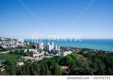 View of the sea and the houses of the city of Sochi. 102302753