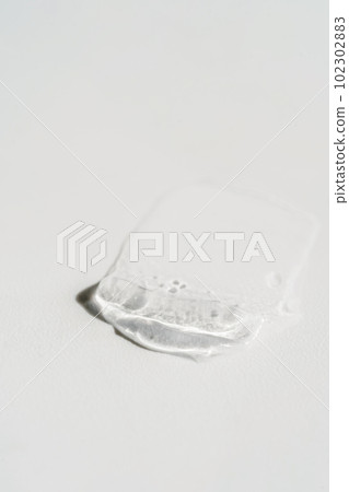 Transparent cosmetic gel on the white background. 102302883