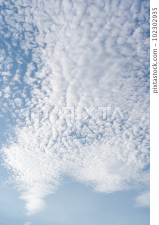 Natural background with blue sky and white clouds. Natural background with blue sky and white clouds. 102302935
