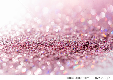Abstract sequin background with shining festive bokeh. 102302942