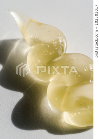 Transparent cosmetic gel on the white background. 102303017